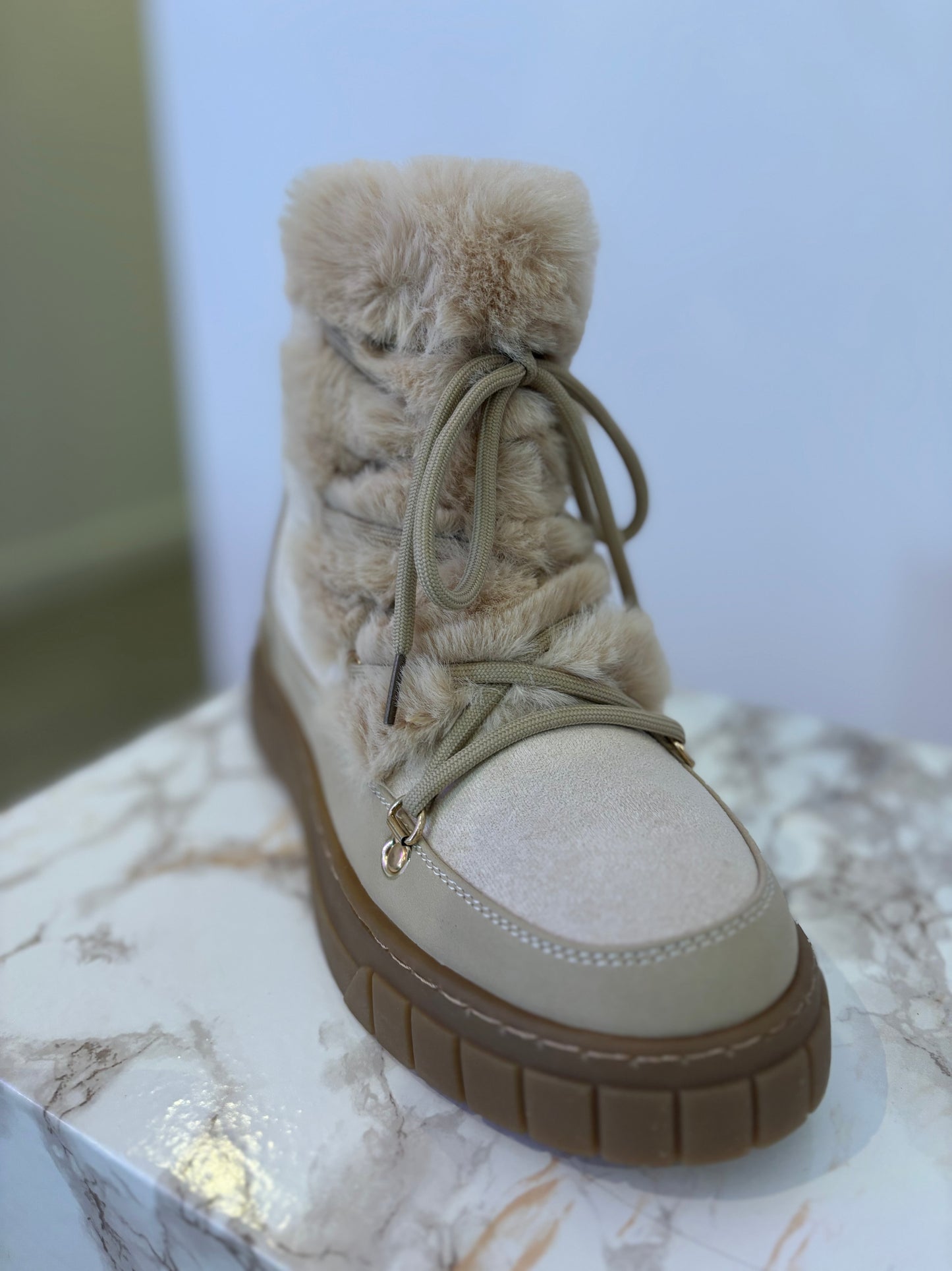 Bottines fourrures beige