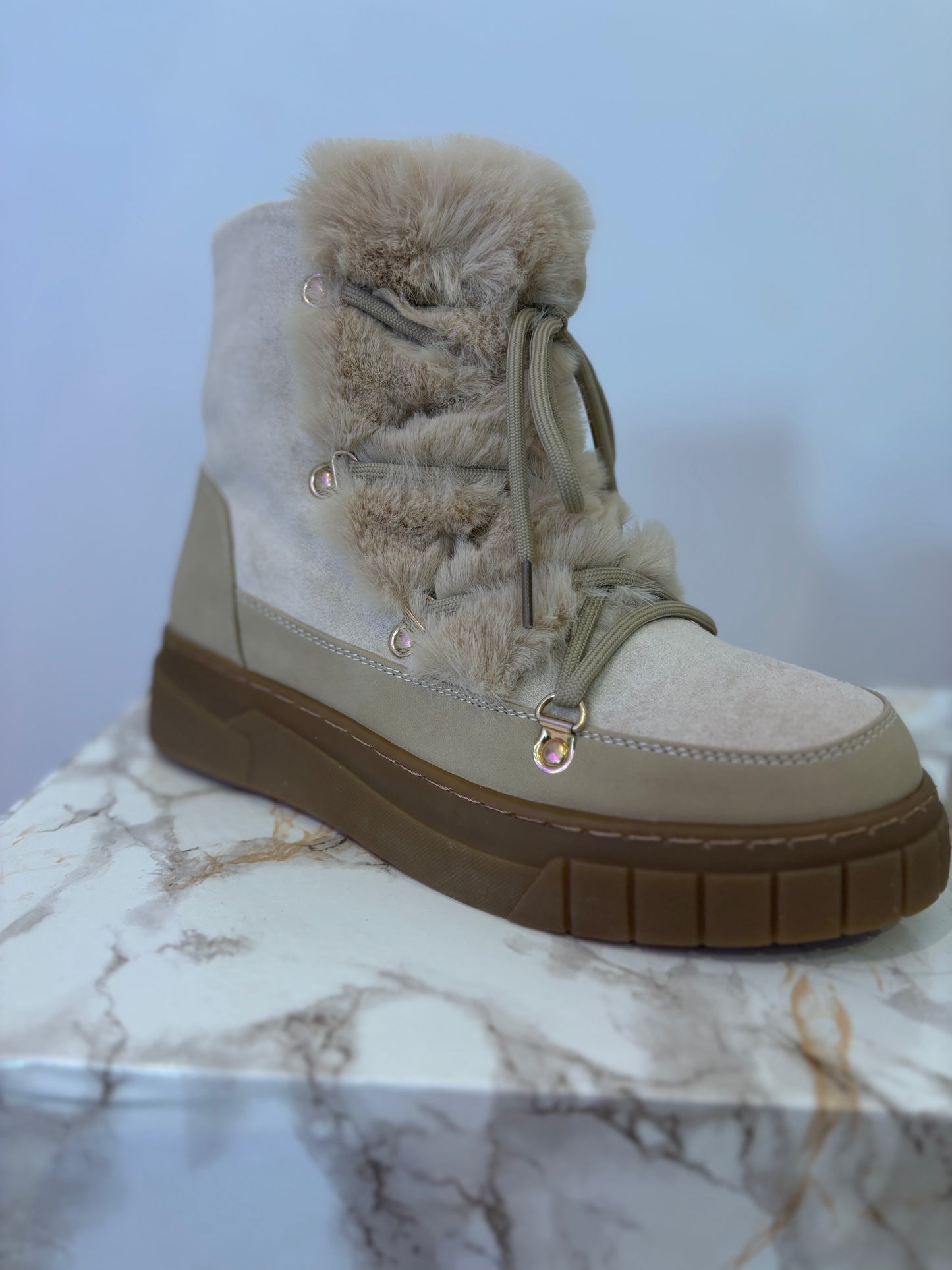 Bottines fourrures beige